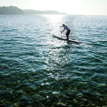 Hotel Slovenija - Terme & Wellness Lifeclass Portoroz Luaran gambar Stand-up paddle boarder on Lake Balaton